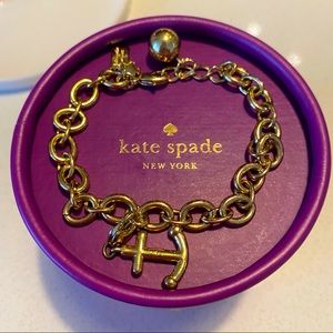 Kate Spade New York gold charm bracelet with anchor charm